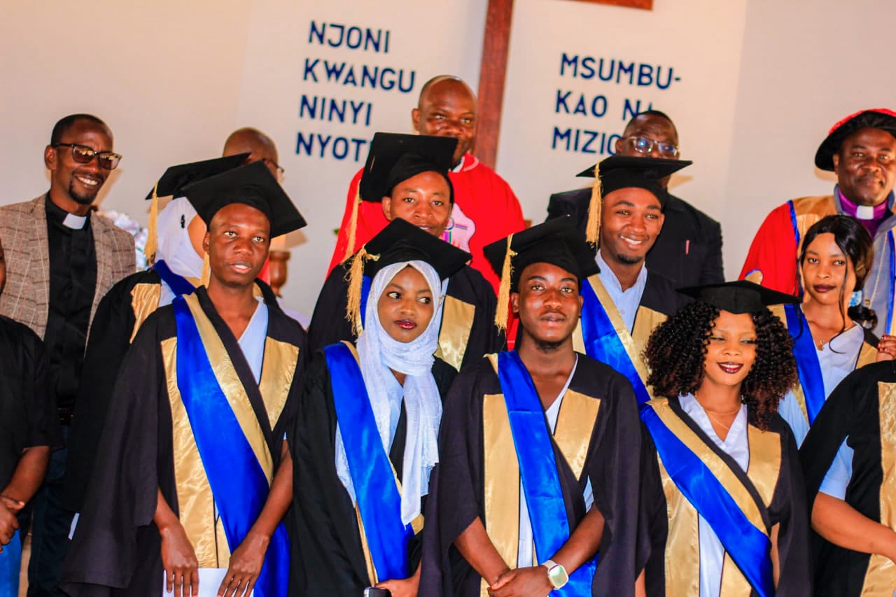 Group photo of graduates with some leaders from the E.L.C.T ULANGA KILOMBERO DIOCESE